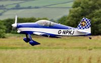 G-NPKJ @ EGFP - Visiting RV-6 departing Runway 22. - by Roger Winser