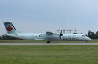 C-GGMQ @ CYOW - DHC-8-402 - by Mark Pasqualino