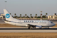 UR-CNE @ LMML - B737-500 UR-CNE Bravo Airways - by Raymond Zammit