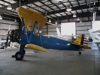 N2212G @ O22 - Locally-based 1942 Boeing-Stearman N2S-3 Kaydet in hangar @ Columbia, CA (s/n 75-7525 BuAer now registered to owner in Bend, OR) - by Steve Nation