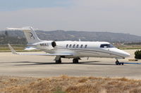 N411AJ @ CMA - 2004 Bombardier Aerospace Learjet 45, 2 Honeywell TFE731-20-1B turbofans each flat rated at 3,500 lb st, with FADEC, T-tail, winglets. On SUN AIR ramp. All data from my 2003-2004 Jane's All The World's Aircraft. Please correct aircraft builder.  - by Doug Robertson