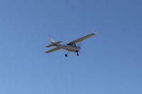N704JH @ SZP - 1976 Cessna 150M, Continental O-200 100 Hp, another takeoff climb - by Doug Robertson