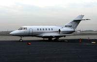 N819AB @ KOAK - 2001 Raytheon HAWKER 800XP visiting @ Oakland International Airport North ramp (reregistered N223FA in 2008) - by Steve Nation