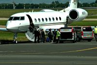 N650FJ @ EGCC - loading pax - by andysantini