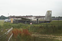 G-CEXP @ EGKK - After display on the (now closed) public observation deck at Gatwick, the hulk was apparently dumped in a fire training area at the western end of the site, adjacent to an overlook from the grounds of Gatwick Aviation Museum.  It looks in a sorry state! - by Neil Henry