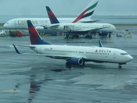 N394DA @ JFK - Boeing 737-800 - by Christian Maurer