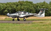 D-IRAY @ EGFH - Visiting DA62 arriving on Runway 22.. - by Roger Winser