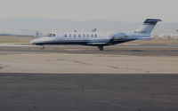 N423FX @ KOAK - FLEXJETS 2001 Learjet 45 taxiing for take-off @ Oakland International Airport, CA North Field (reregistered N423FA 2008-01-24) - by Steve Nation