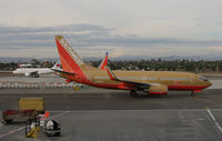 N768SW @ KLAX - SOUTHWEST 2000 Boeing 737-7H4 with winglets and in old colors taxiing for take-off @ LAX in late afternoon - by Steve Nation