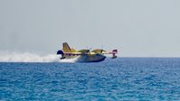 I-DPCZ - Scalea Italy loading up on water in the Mediterranean. - by Clayton Eddy