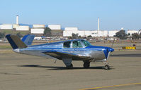N2960F @ KCCR - All silver colored 1953 Beeh D35 V-tailed Bonanza on hotel vistor's ramp  @ Buchanan Field, Concord, CA - by Steve Nation