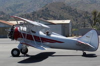 N32135 @ SZP - 1941 Waco UPF-7, Continental W670 220 Hp radial, chromed prop and spinner, S-turns taxi to Rwy 22 - by Doug Robertson