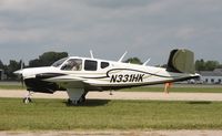 N331HK @ KOSH - Beech M35