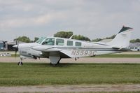 N5593C @ KOSH - Beech A36 - by Mark Pasqualino