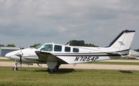 N7254P @ KOSH - Beech 58