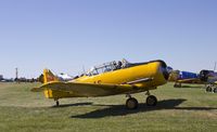 N47217 @ KOSH - Harvard taxing out of the warbird area at Airventure. - by Eric Olsen