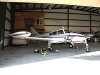 N3071L @ KVCB - Locally-based 1965 Cessna 310J in open hangar @ Nut Tree Airport, Vacaville, CA (sold to new owner in Fort Walton Beach, FL 2011-04-26) - by Steve Nation