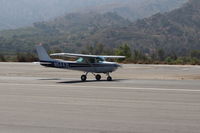 N5443L @ SZP - 1980 Cessna 152, Lycoming O-235 115 Hp, landing roll Rwy 22 - by Doug Robertson