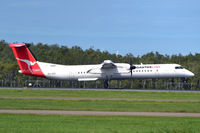VH-QOC @ YBBN - At Brisbane - by Micha Lueck
