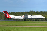 VH-QOI @ YBBN - At Brisbane - by Micha Lueck