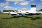 N811AC @ OSH - 1959 Beech D50C, c/n: DH-239 - by Timothy Aanerud