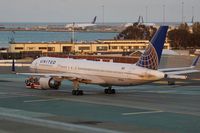 N595UA @ KSFO - Putting the cows in the barn for the night. SFO 2017. - by Clayton Eddy