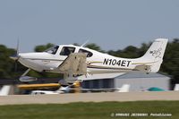 N104ET @ KOSH - Cirrus SR22  C/N 1024, N104ET - by Dariusz Jezewski www.FotoDj.com