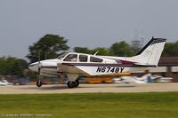 N6748Y @ KOSH - Beech 95-B55 (T42A) Baron   C/N TC-2317, N6748Y - by Dariusz Jezewski www.FotoDj.com