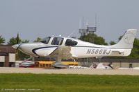 N586WJ @ KOSH - Cirrus SR22T  C/N 0492, N586WJ - by Dariusz Jezewski www.FotoDj.com