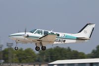 N580W @ KOSH - Beech 58 Baron  C/N TH-774, N580W - by Dariusz Jezewski www.FotoDj.com