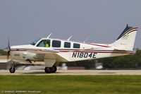 N1804E @ KOSH - Beech A36TC Bonanza 36  C/N EA-231, N1804E - by Dariusz Jezewski www.FotoDj.com