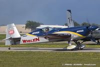 N821MG @ KOSH - Extra EA-300S  C/N 1035, N821MG
