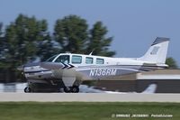 N136RM @ KOSH - Beech A36TC Bonanza 36  C/N EA97, N136RM - by Dariusz Jezewski www.FotoDj.com