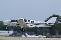 N341E @ KOSH - Raytheon Aircraft Company G58 Baron  C/N TH2141, N341E - by Dariusz Jezewski www.FotoDj.com