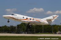 N18SK @ KOSH - Dassault Falcon 10  C/N 34, N18SK - by Dariusz Jezewski www.FotoDj.com