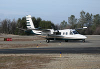 N690AR @ KAUN - Visiting 1974 Aero Commander 690A Turbo Commander taxis in @ Auburn Municipal Airport, CA