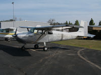 N6634A @ KAUN - Locally-based straight tail 1956 Cessna 172 Skyhawk stripped of paint @ Auburn Municipal Airport, CA