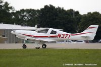 N371 @ KOSH - Lancair 320  C/N 311-320-73, N371 - by Dariusz Jezewski www.FotoDj.com