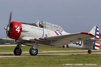 N7648E @ KOSH - North American SNJ-3 Texan  C/N 786987 - Geico Skytypers, N7648E