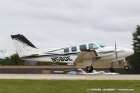 N580E @ KOSH - Beech 58 Baron  C/N TH-1758, N580E - by Dariusz Jezewski www.FotoDj.com