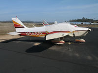 N9486K @ KAUN - Locally-based 1976 Piper PA-28-151 under cover @ Auburn Municipal Airport, CA