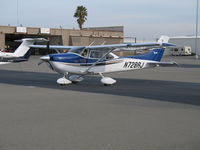 N728RJ @ KLHM - Locally-based 2004 Cessna 182T Skylane with door opening @ Lincoln Regional Airport (Karl Harder Field), CA (registration CX 2010-10-27 as exported to South Africa as ZS-LML) - by Steve Nation