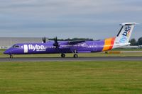 G-JECG @ EGCC - Flybe DHC8 appears to have a new door fitted. - by FerryPNL