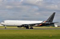 G-POWD @ EGCC - Titan B763 powering past. - by FerryPNL