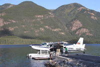 C-GRMU @ CBF8 - On the water of Muncho Lake at the Northern Rockies Lodge, BC.