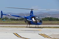 N3189Z @ KBOI - Hovering over south helicopter landing pad. - by Gerald Howard