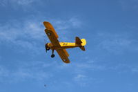 N75753 @ SZP - 1942 Boeing Stearman A75N1 (PT-17) as Navy N2S-4 basic trainer, Continental W670 220 Hp radial, takeoff climb Rwy 22 - by Doug Robertson