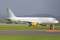 EC-LOC @ EGFF - A320-214, Vueling Airlines, callsign Vueling 12AV, previously F-WWBF, seen landing taxxing in out of	Alicante.