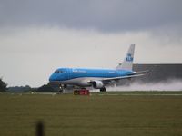 PH-EXM @ EGSH - Making a nice spray on take off after bit of a downpour - by AirbusA320