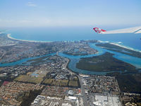 9M-XXP - Leaving the Gold Coast (OOL-AKL) - by Micha Lueck